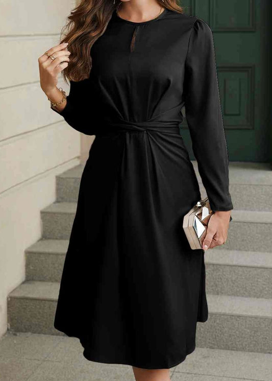 ladies long sleeve black dress with wrap around tie in back