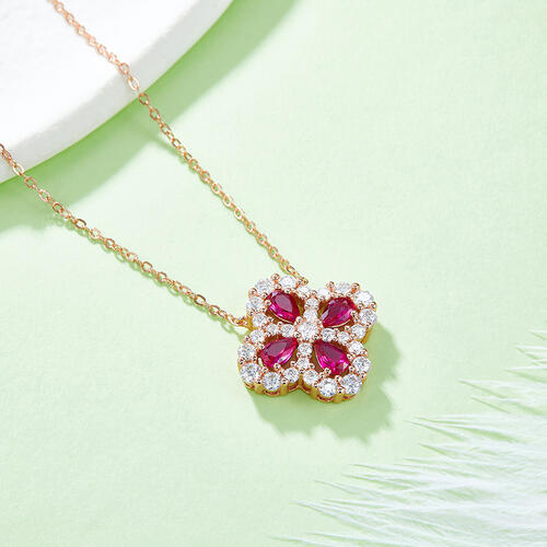LAB GROWN RUBY COLORED MOISSANITES SET in ROSE GOLD PLATED  925 STERLING SILVER FLOWER NECKLACE